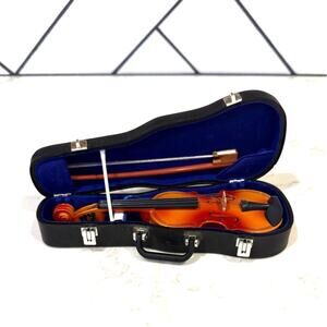 American Girl doll violin and case includes a miniature violin, bow, and case